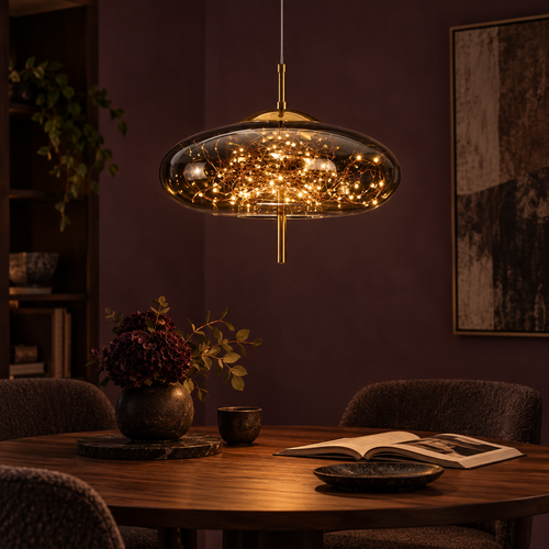 Caligo Disc pendant in smoked grey glass, warm LED wires lit inside, hanging over a round dining table