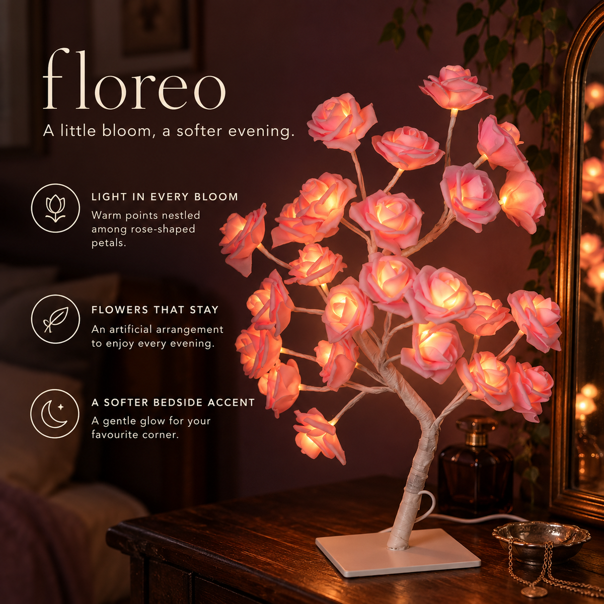 Pink Floreo rose lamp glowing on a dark dressing table — light in every bloom.