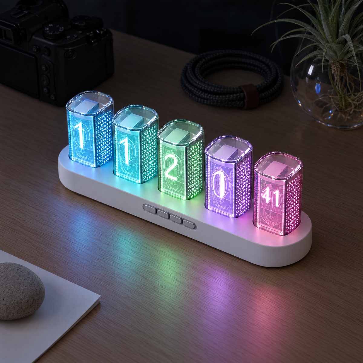 Fulgor colour-changing desk clock in white, each of the five tubes lit a different colour