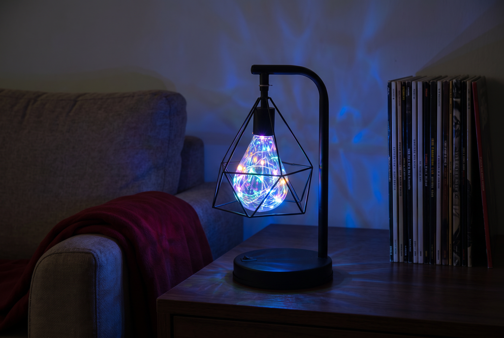 Glimmer colorful USB cage table lamp in a dim listening corner