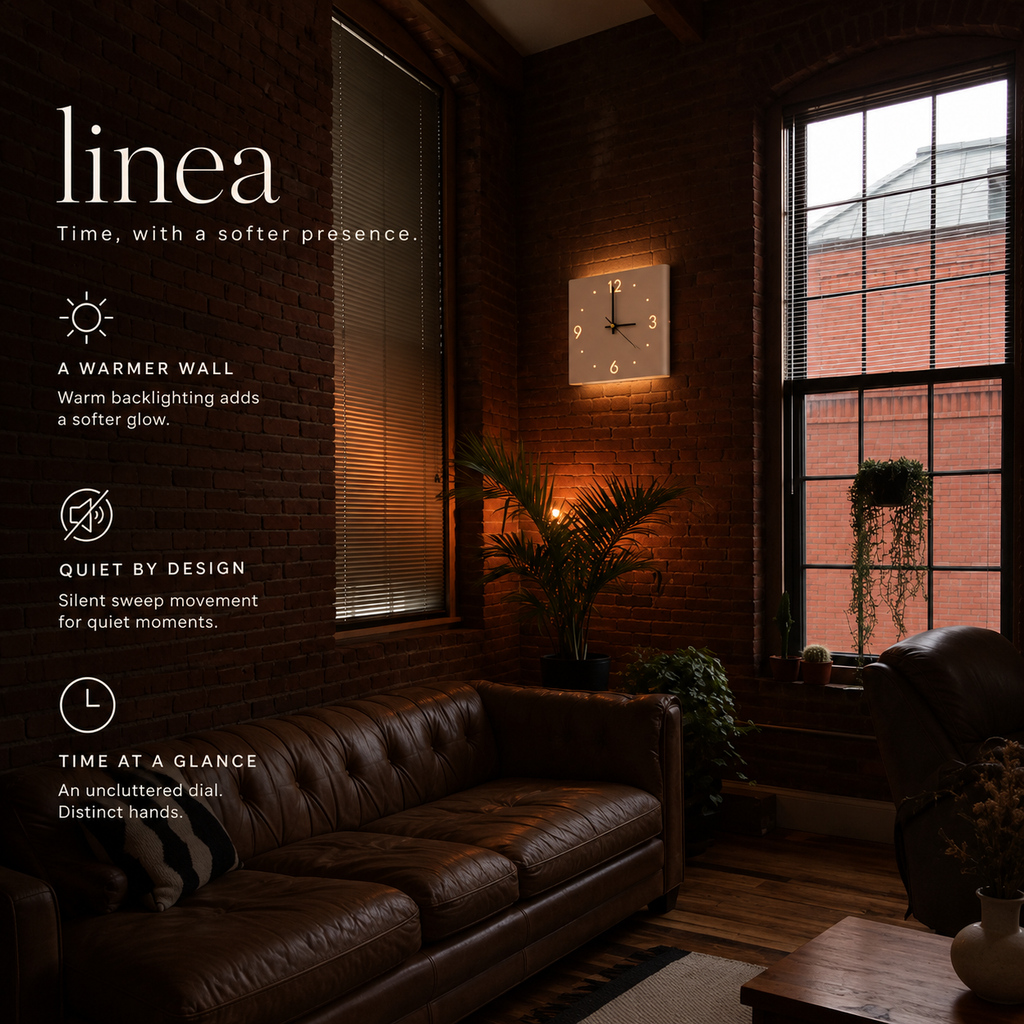 Cream White Linea in a brick loft: warm backlighting, silent sweep movement and a clear dial.