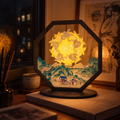 Liora Landscape paper-cut lantern with a warm glowing centre and illustrated mountain scene