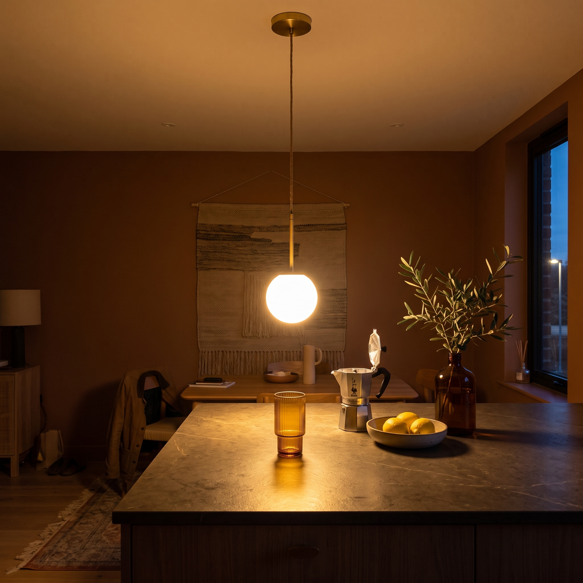 The pendant over a kitchen island at night